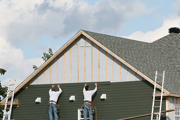 Professional Siding technician working in Peyton, CO